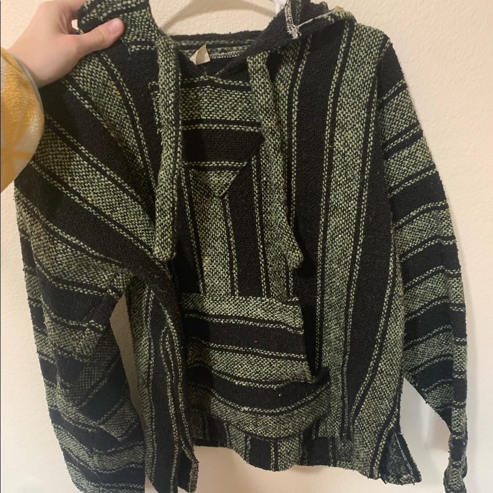Green and black drug rug